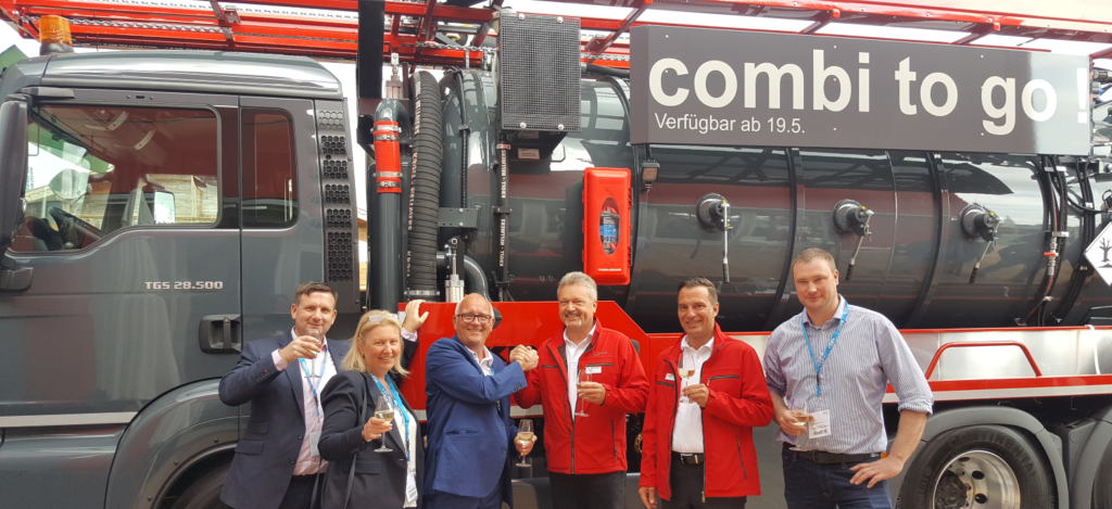 Celebrating CountyClean Group’s latest major equipment deal at iFAT on 15th May 2018 with a hearty handshake in front of one of KROLL’s combination tank units. From left: CountyClean Group – Trevor Beer, Operations Director; Debbie Walker, Director & Owner; Mike Walker, Managing Director and Owner. KROLL Fahrzeugbau- Umwelttechnik GmbH – Jens Skowronnek, Managing Director; Sven Schepler, Head of Sales & Marketing. For O'C Mechanical Services – Damien O’Connor, Director.