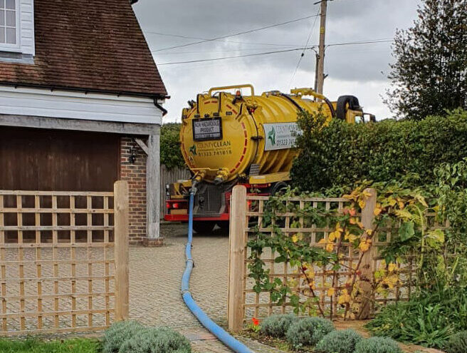 A CountyClean Group Vacuum tanker emptying a domestic septic tank